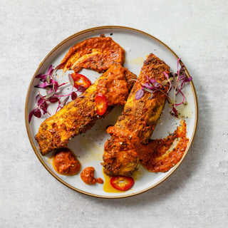 Image 1 Sustainably sourced fillet of Moroccan spiced salmon with a rosewater and red pepper harissa sauce