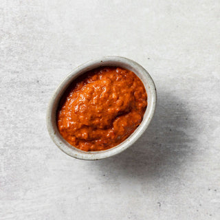 Red pepper harissa sauce with rosewater